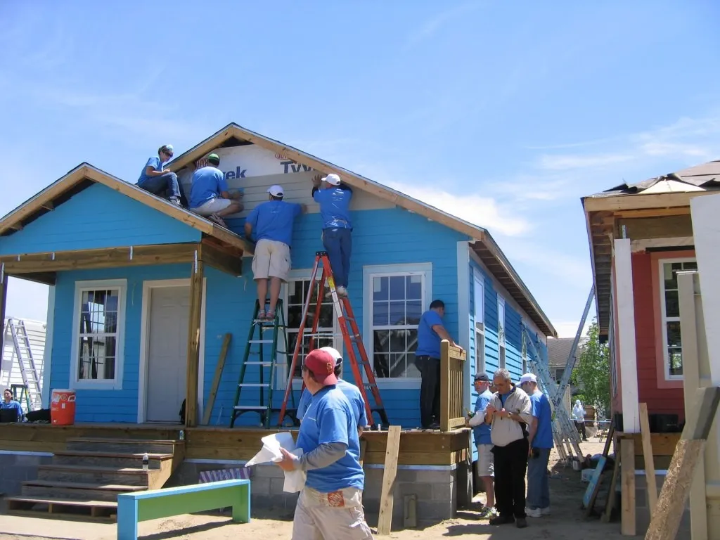 Volunteers at a Habitat for Humanity house build