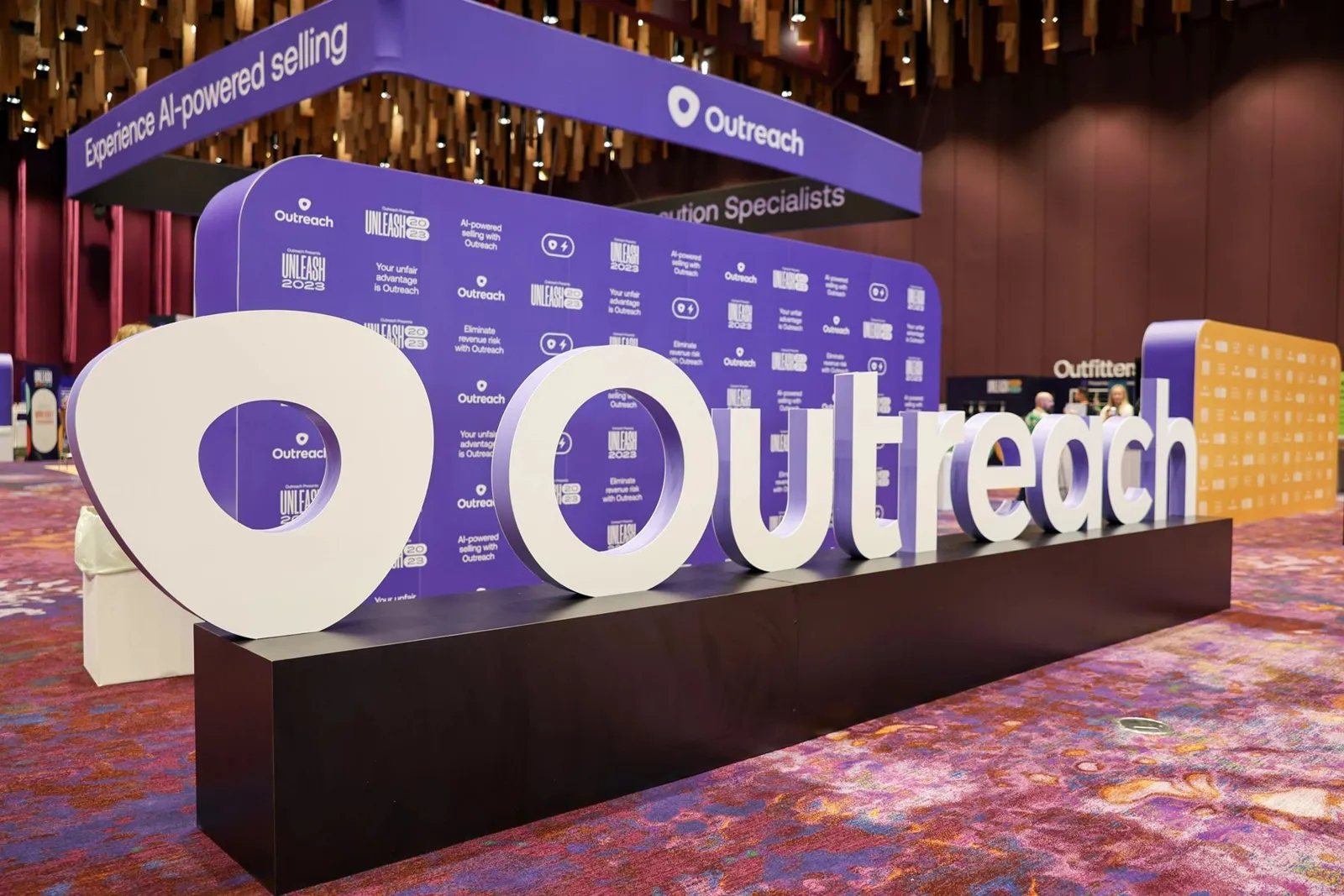 Outreach logo installation in the Unleash 2023 expo area