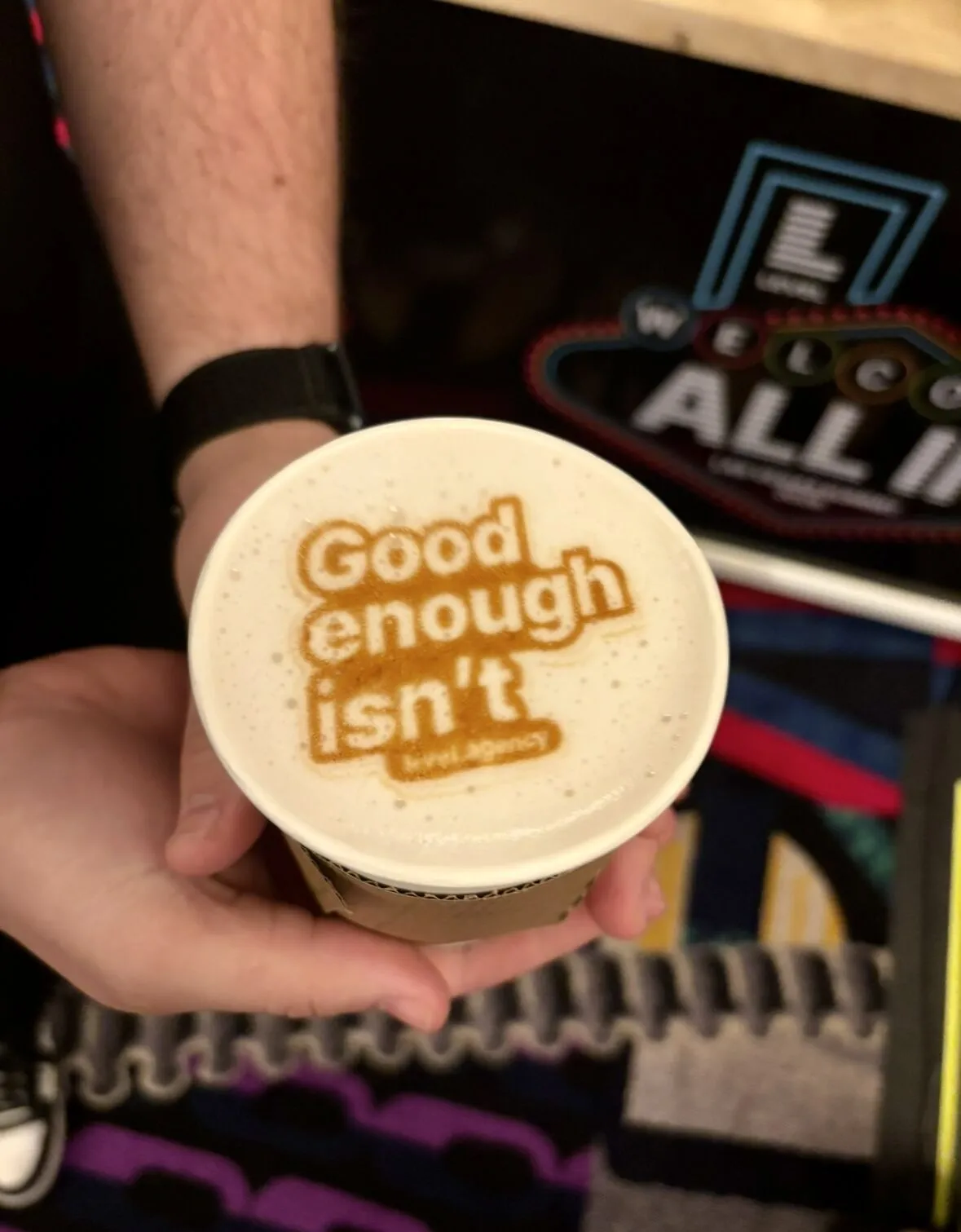 Latte printed with a custom message for summit guests