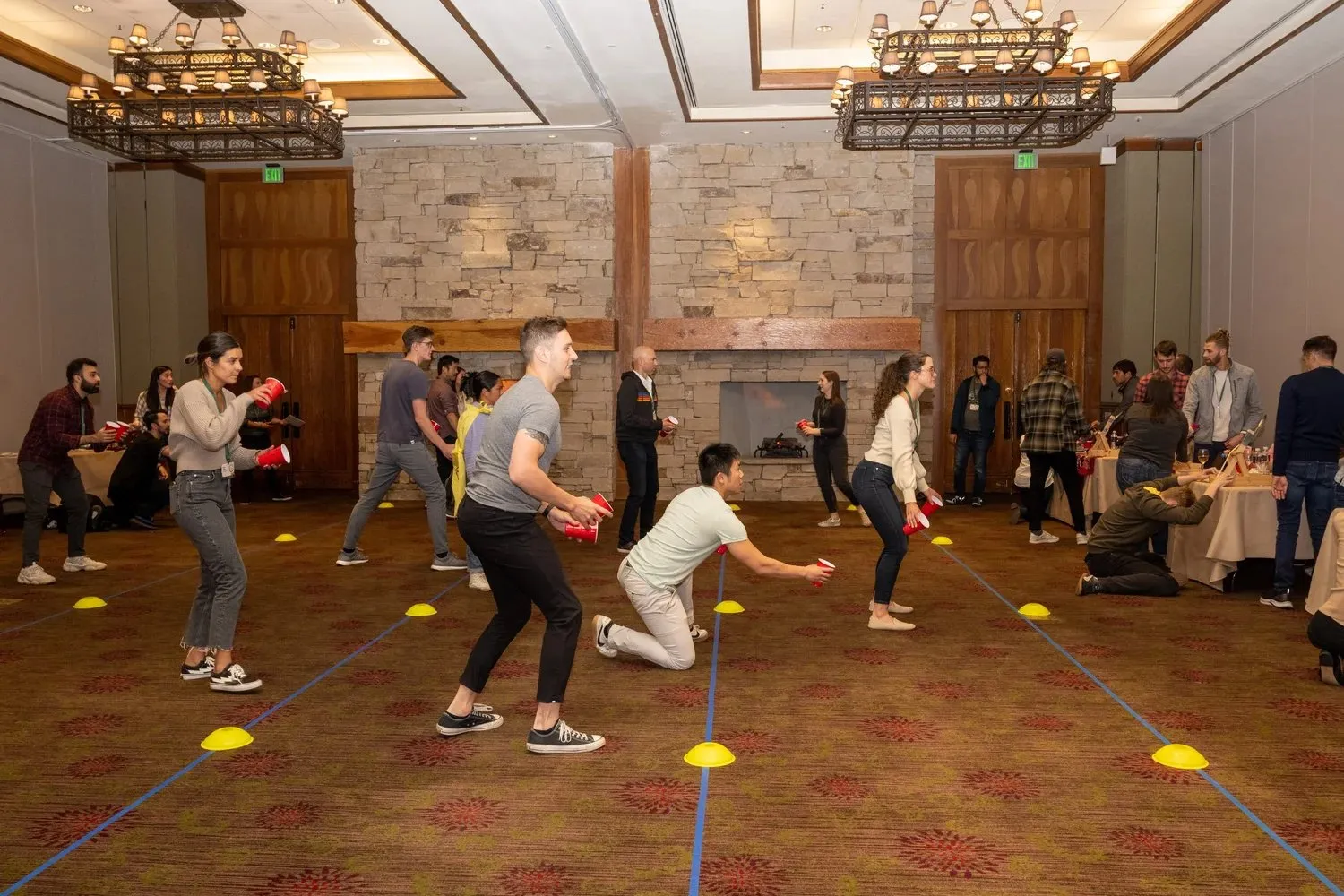 Indoor team-building game in a hotel ballroom during a Park City retreat
