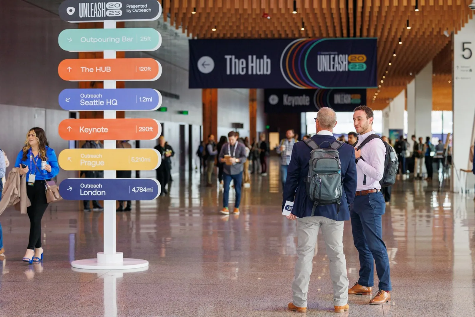 Wayfinding signage and The Hub area at Unleash 2023