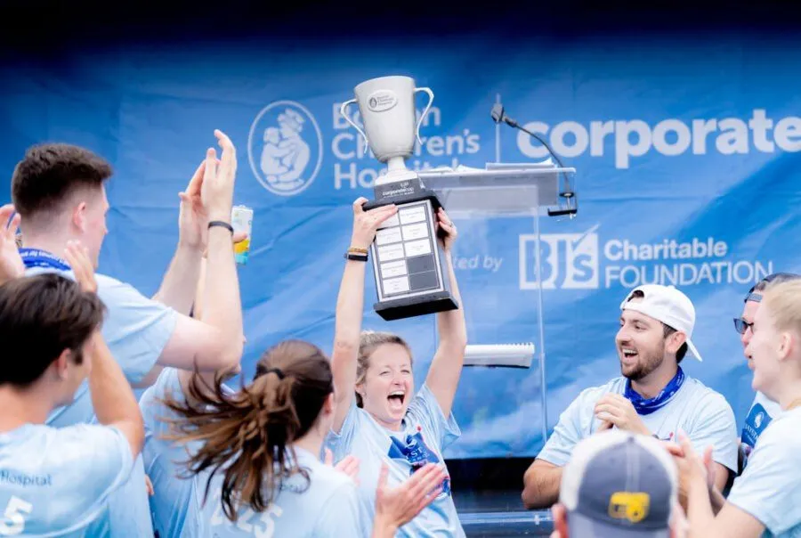 Team celebrating at a branded corporate challenge event