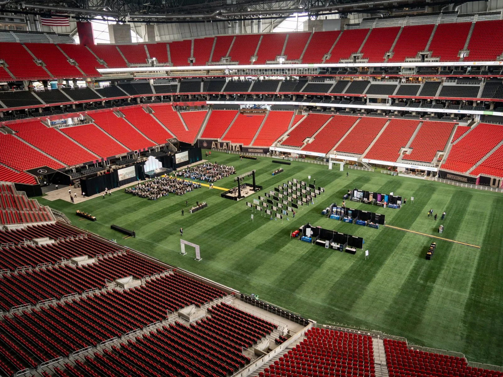 Summit event set up on the field of a stadium