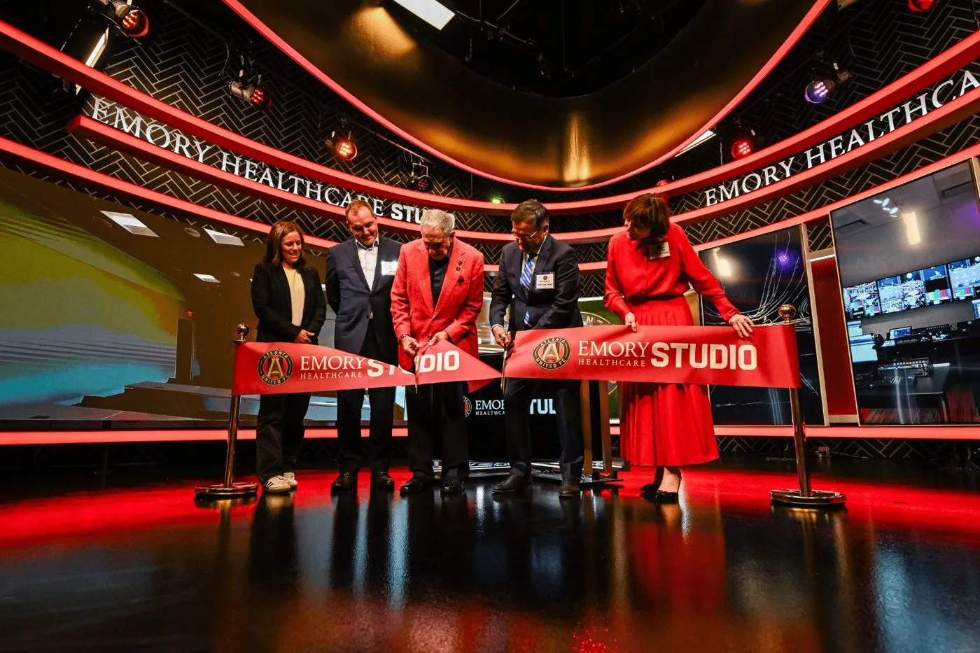 Ribbon cutting on a broadcast studio set