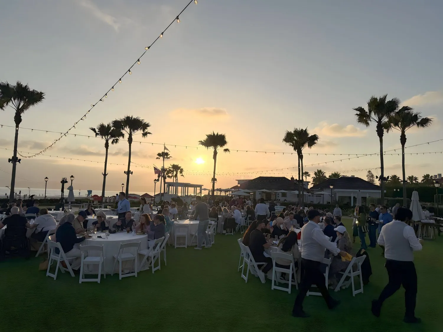 Sunset dinner on the lawn at Hotel del Coronado during the Foster Garvey retreat