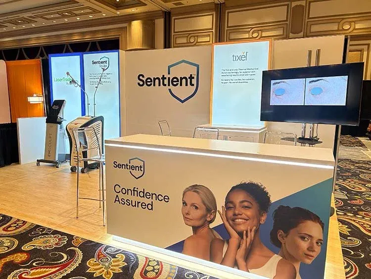 Sentient exhibition booth with product screens and a central counter