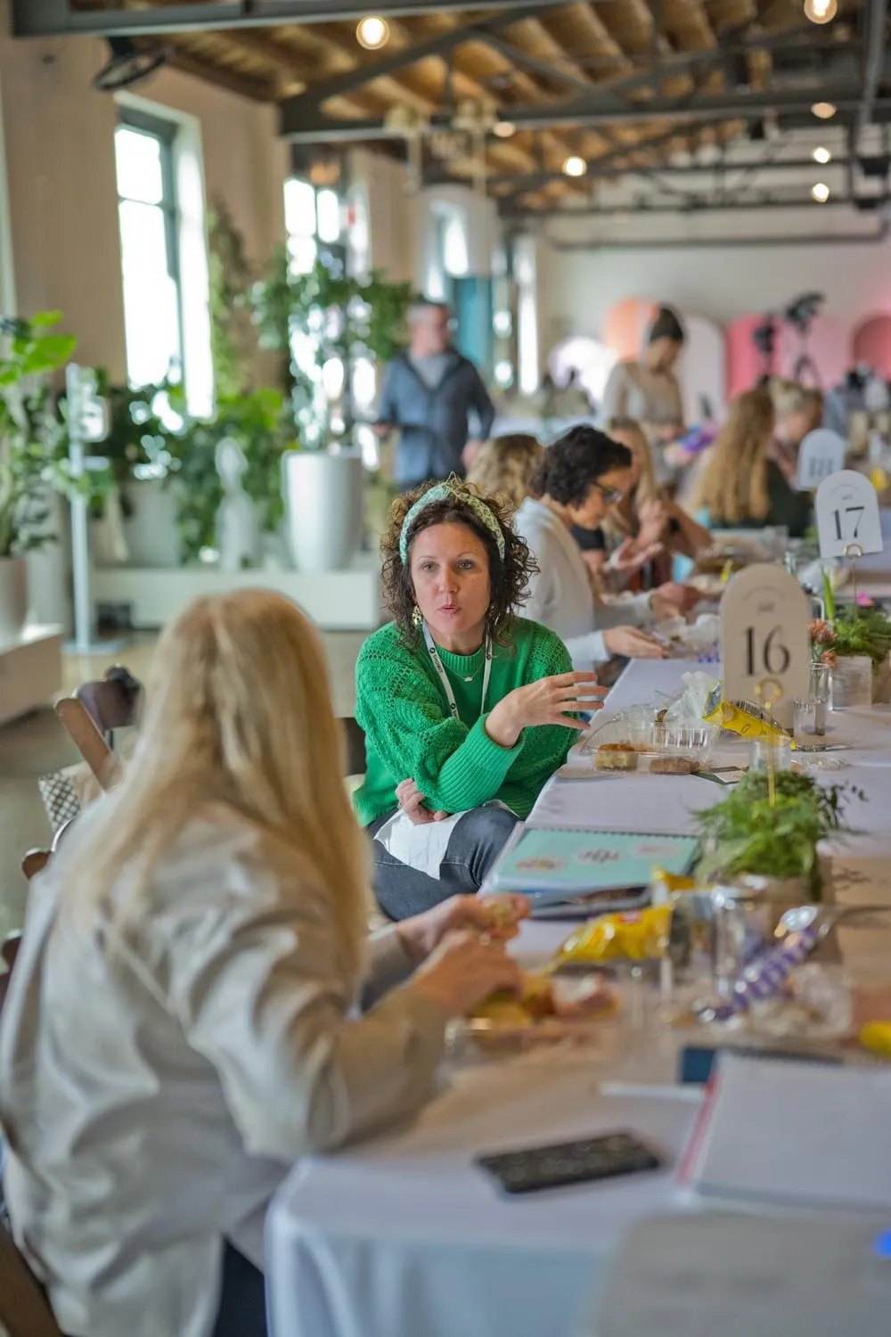 Attendees at long tables during the Elevate Summit