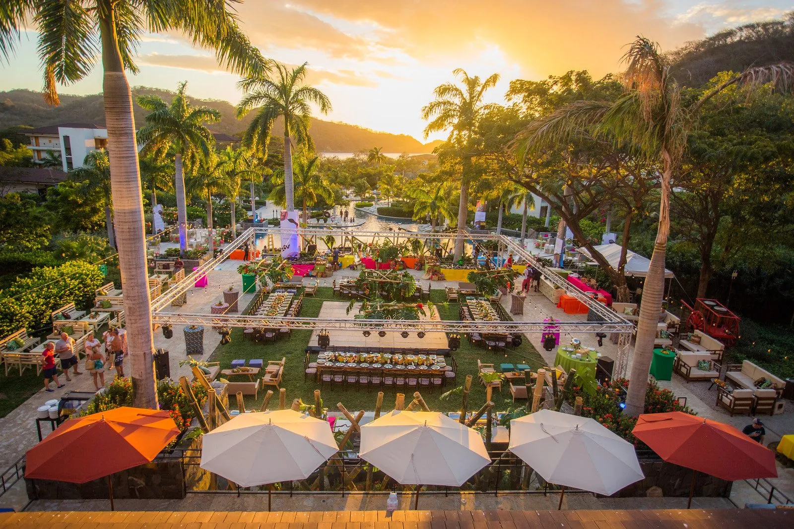 Resort reception with tables and umbrellas at an incentive program