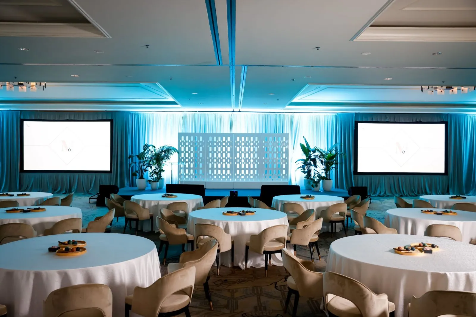 Ballroom set for a multi-day retreat in Half Moon Bay