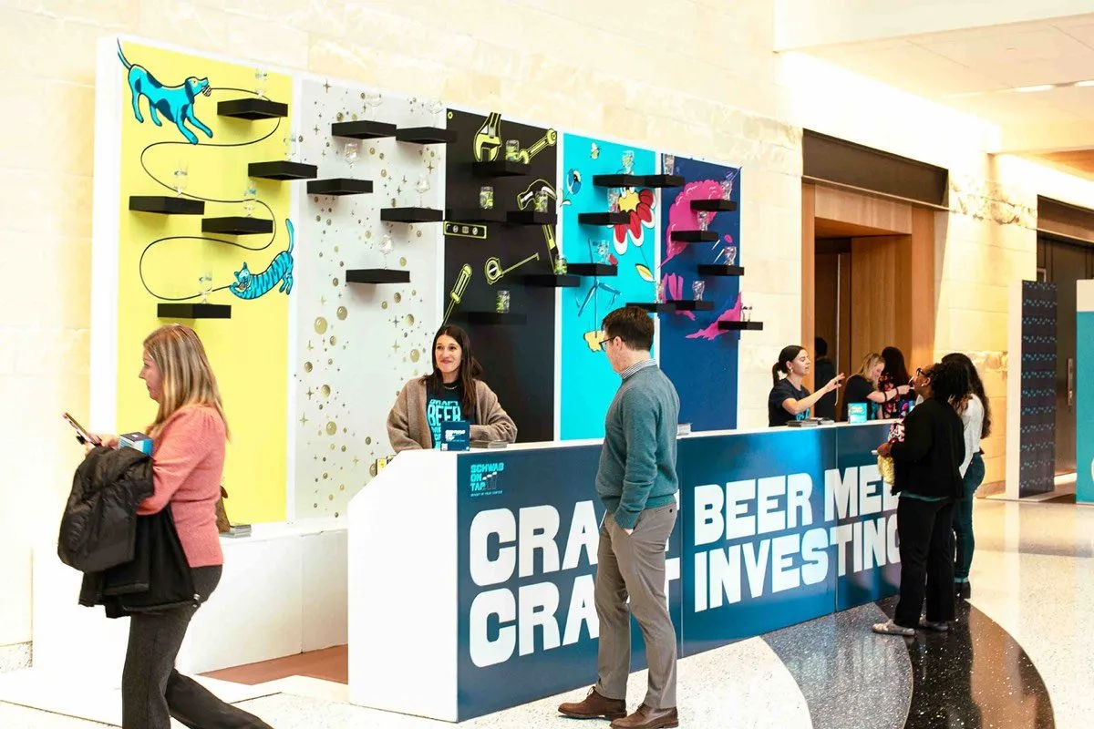 Guests at a branded craft bar display during a corporate activation