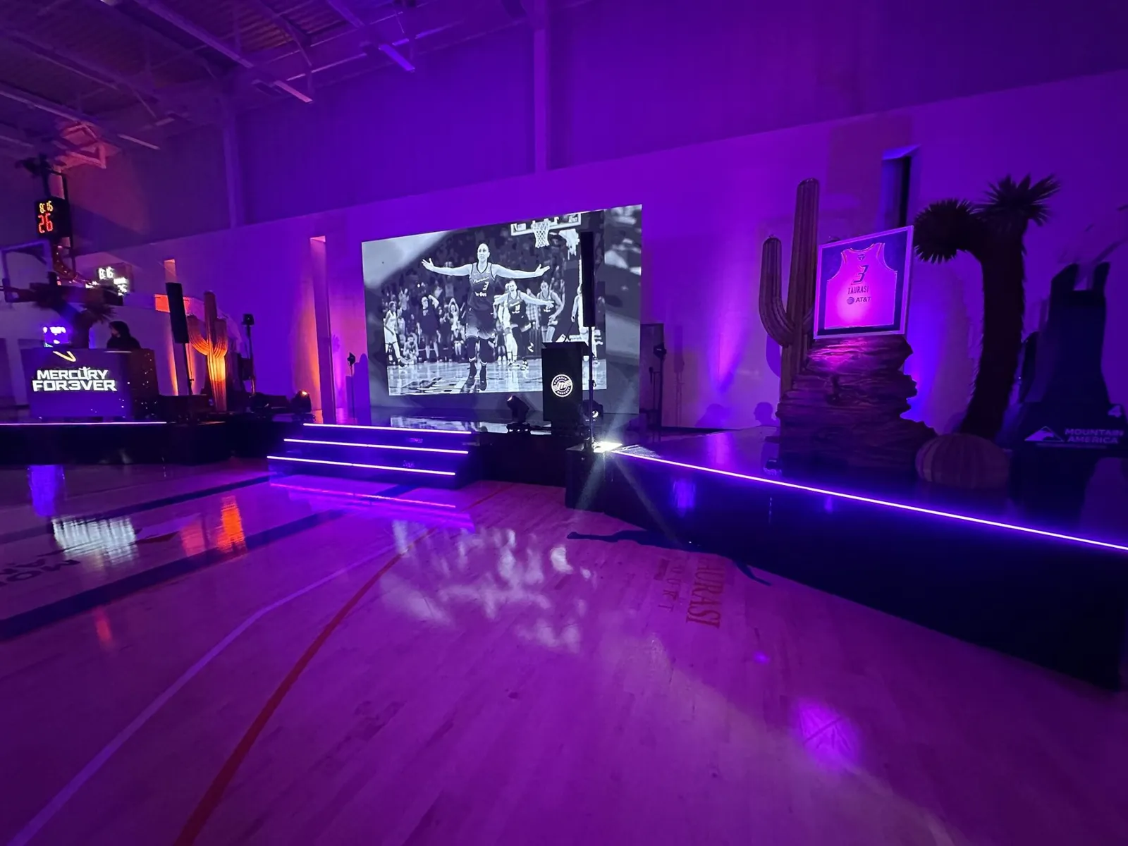 Stage with LED video wall and desert scenic design for the Diana Taurasi retirement event