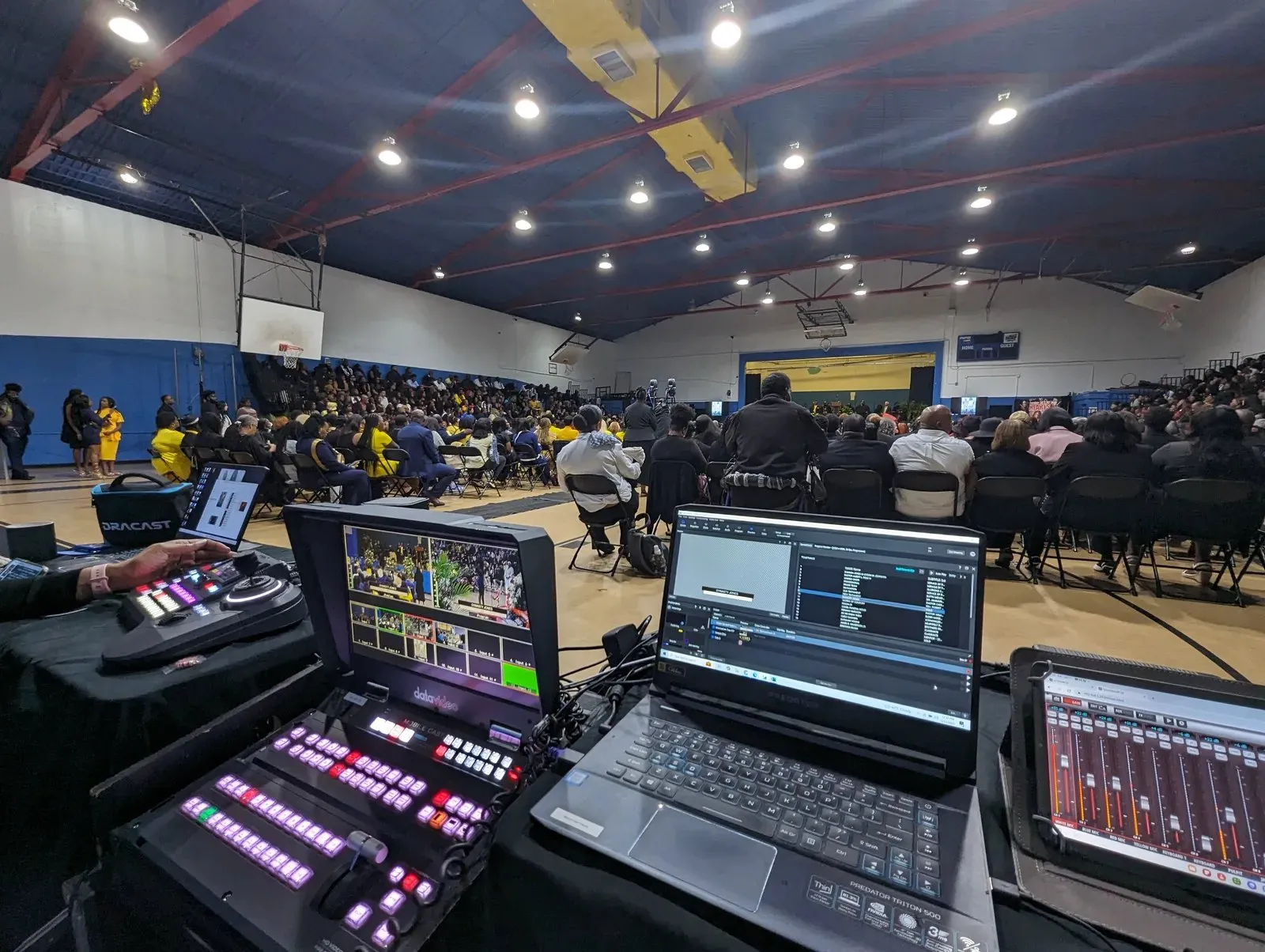 Portable flypack switcher and laptops running a live event in a large hall