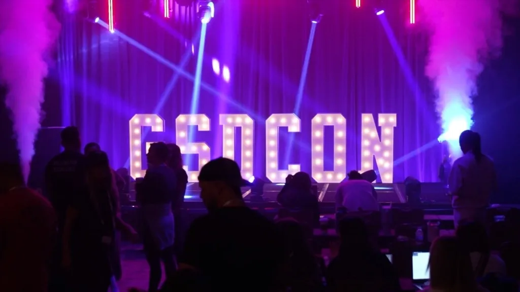 Stage lighting and GSDCON sign at LoudRumor's GSDCON conference, produced by Centric Events