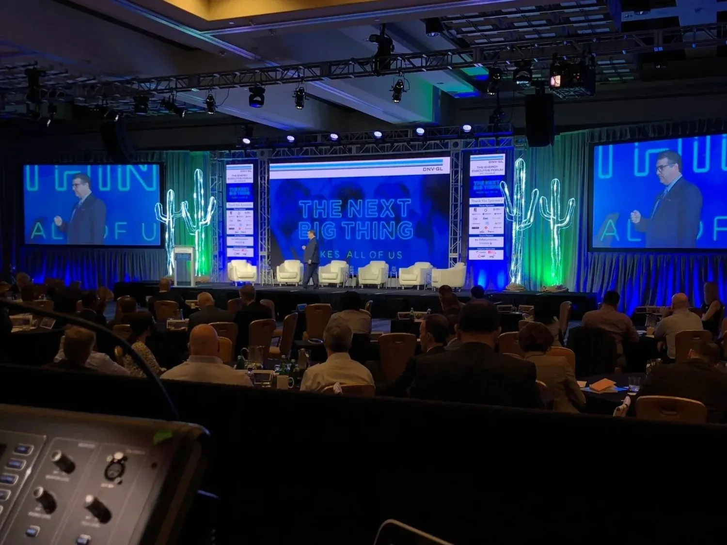 General session with a wide LED wall and branded stage, produced by Fox Audio Visual