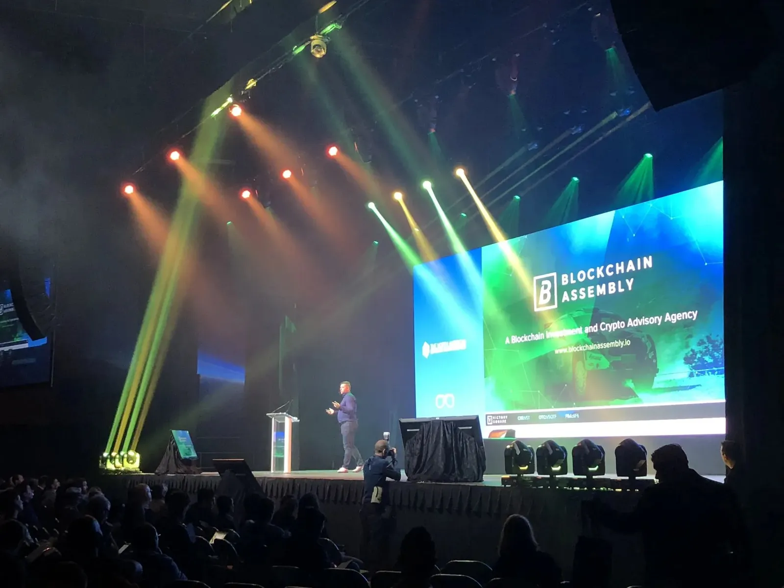 Conference keynote with an LED screen and moving lights at the James L. Knight Center, Miami
