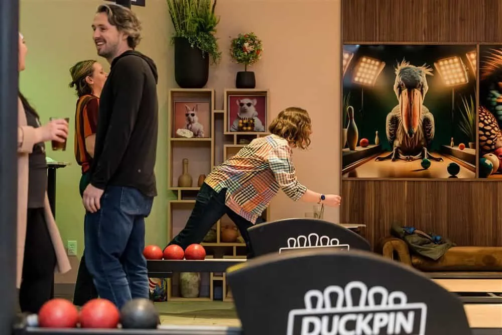 Colleagues bowling on the closing night of the Scottsdale retreat