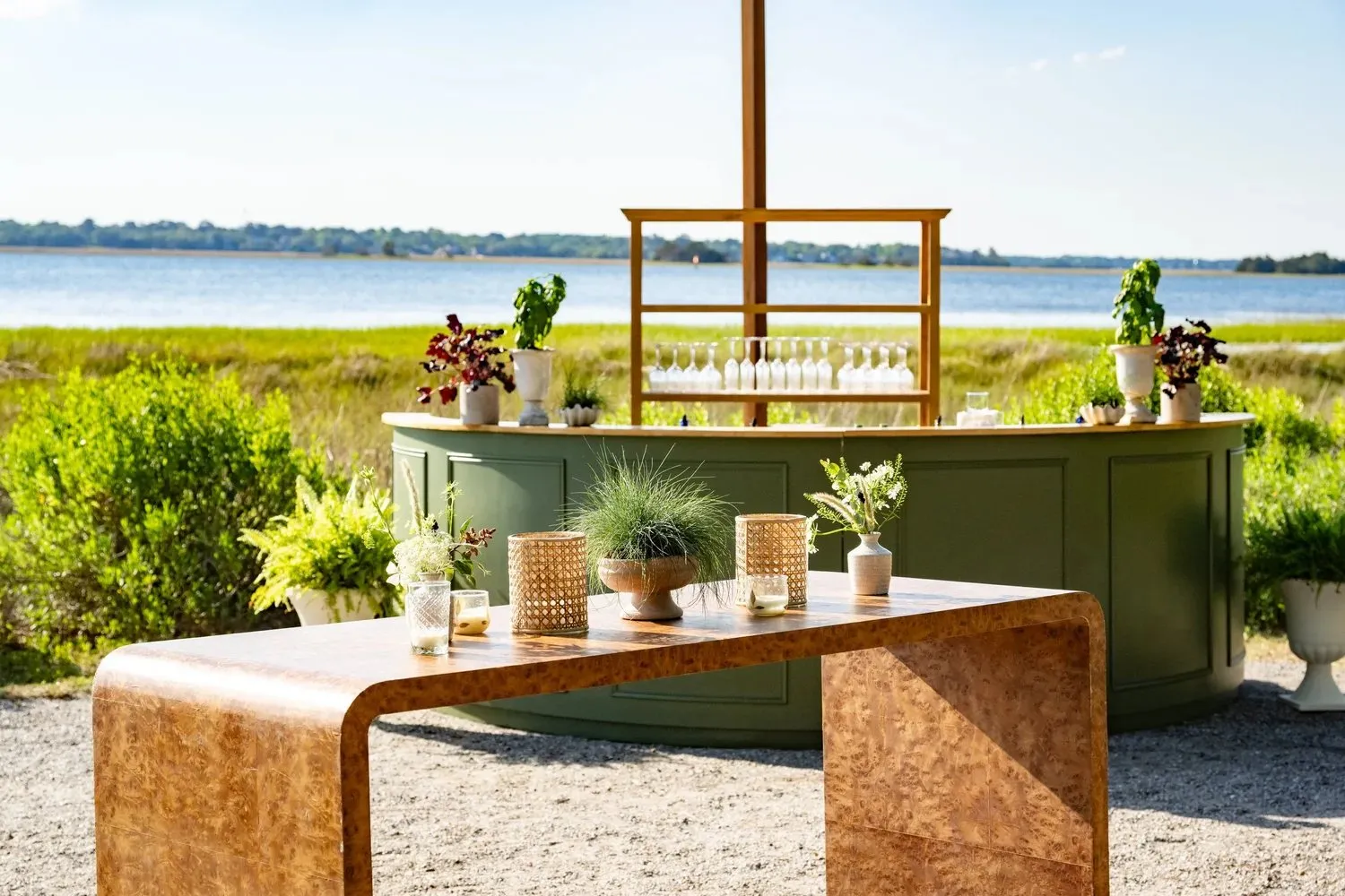 Waterfront reception bar set beside the marsh