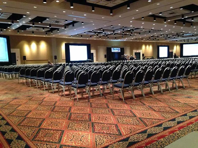 Conference ballroom set theater style with projection screens