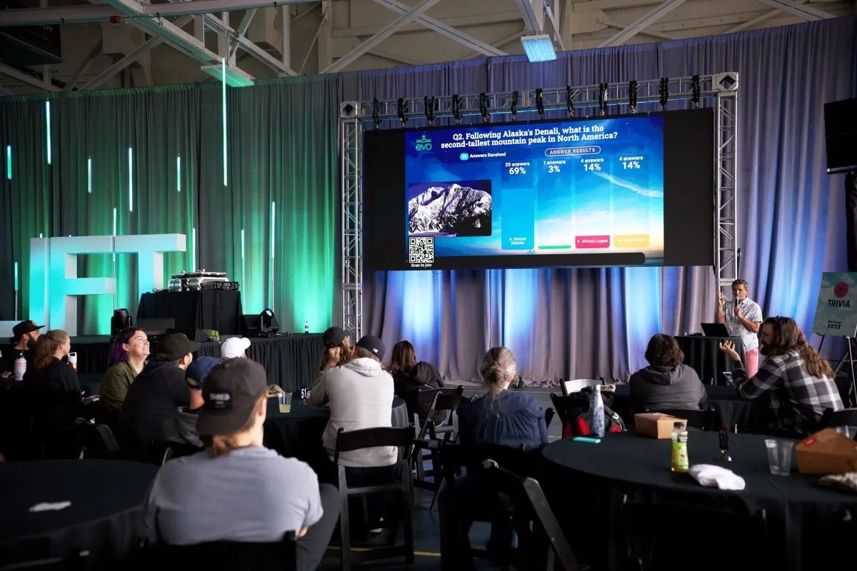 General session with an LED wall at a company retreat in a Seattle hangar
