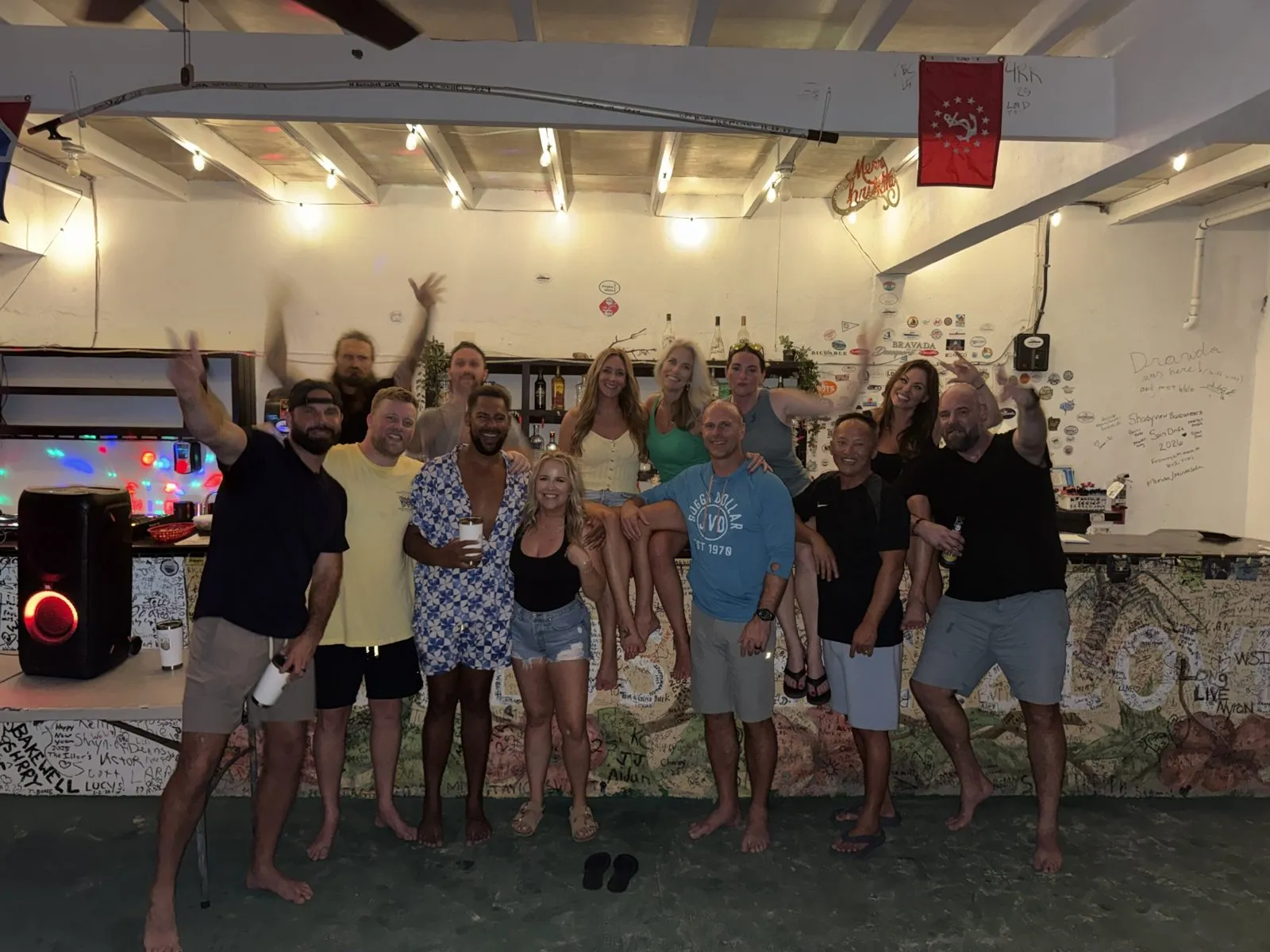 Group of colleagues cheering together at a company event