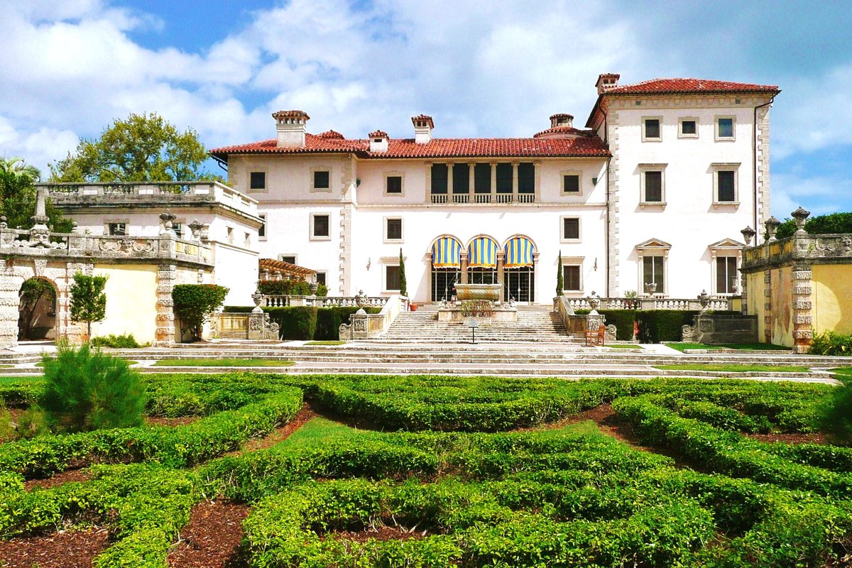 The Vizcaya villa seen over its formal hedge gardens.