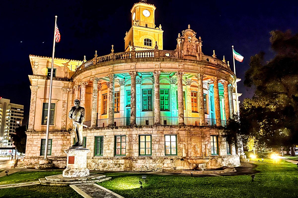 Coral Gables City Hall, lit up at night.