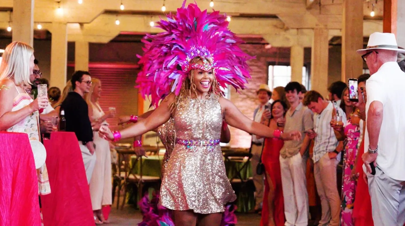 Costumed entertainer greeting guests at a themed reception