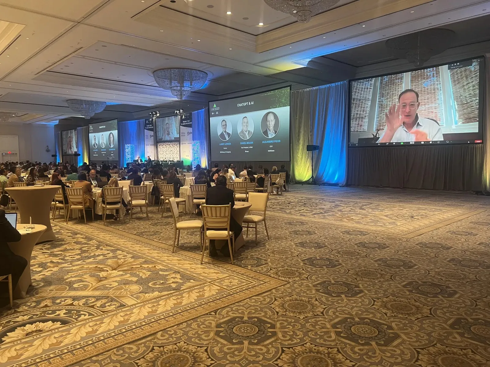 Hybrid event with a remote speaker on screen at Trump National Doral