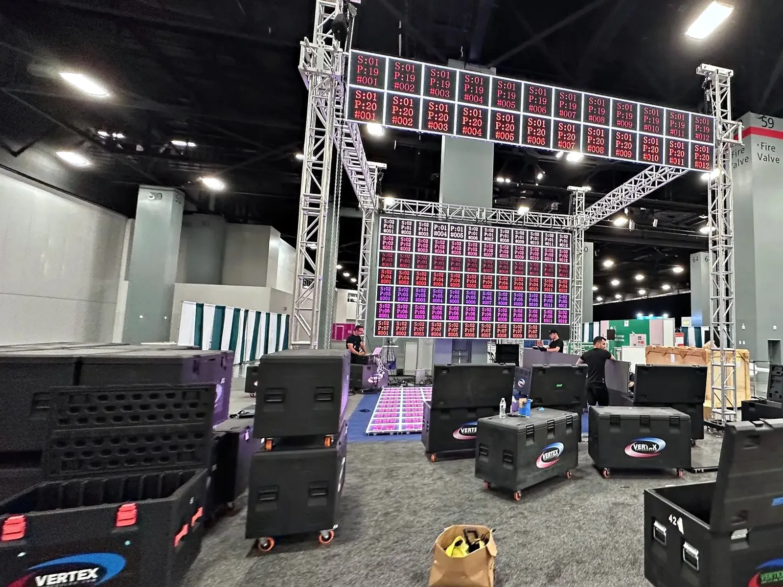 Trade show booth build with truss and LED panels