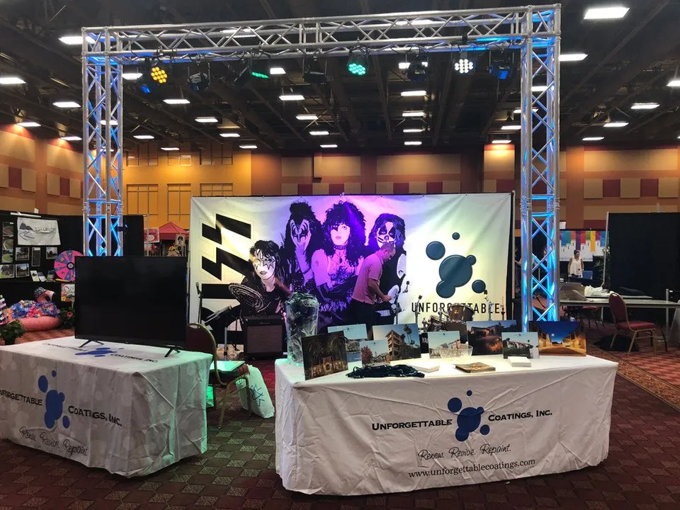 Trade show booth with truss and stage lighting at the Phoenix Convention Center