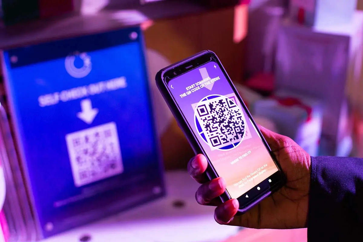 QR self-check-out display at a Shop Small activation