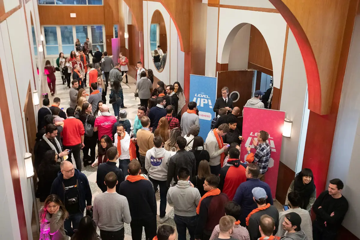 Attendees networking in a venue lobby at a Criteo event