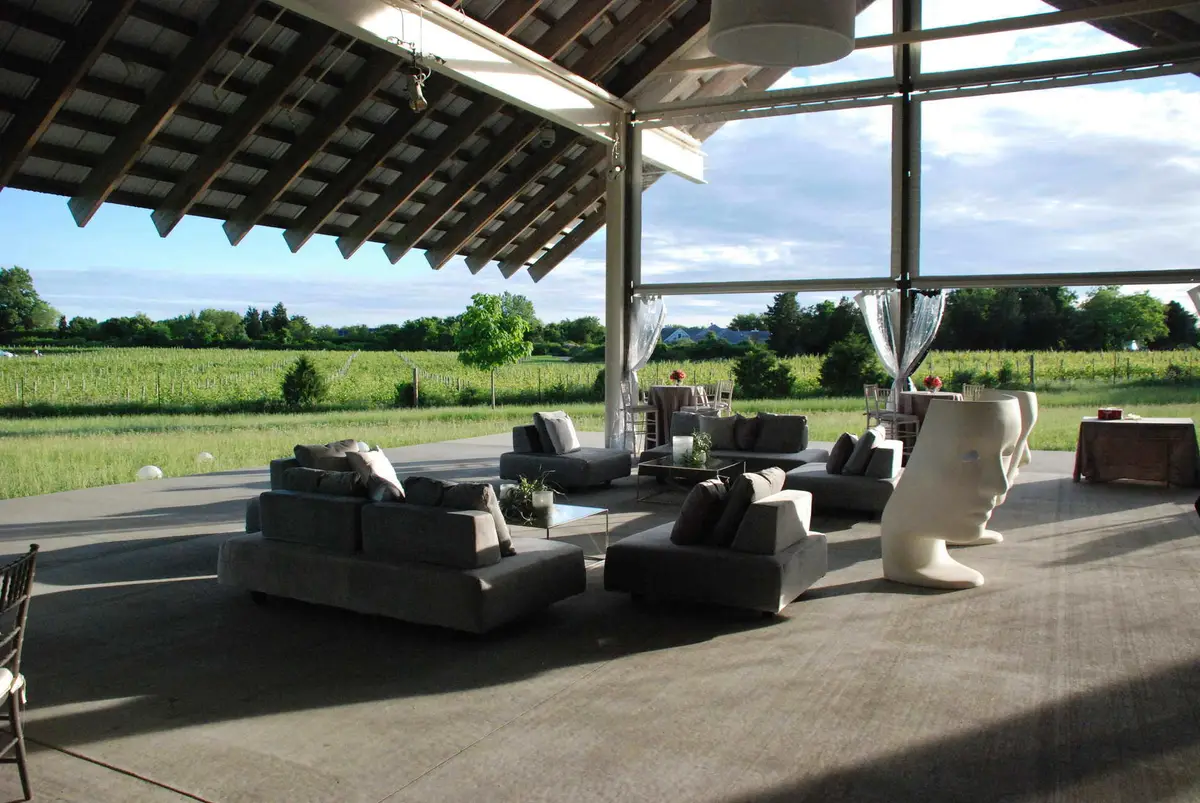 Open-air barn lounge set for a corporate event