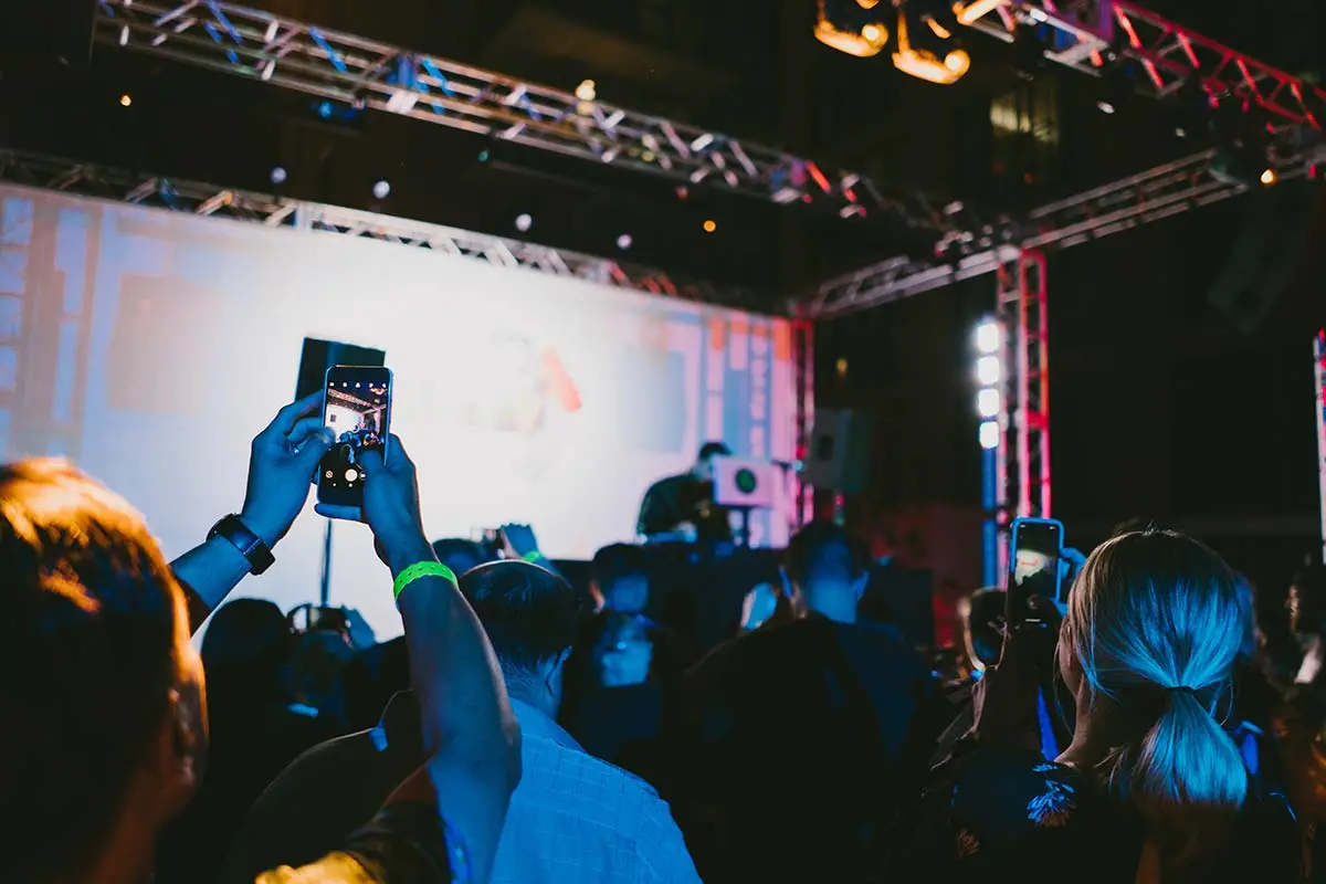 Crowd gathered at a convention stage