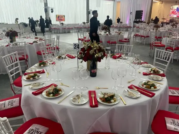 Banquet tables set for a seated dinner