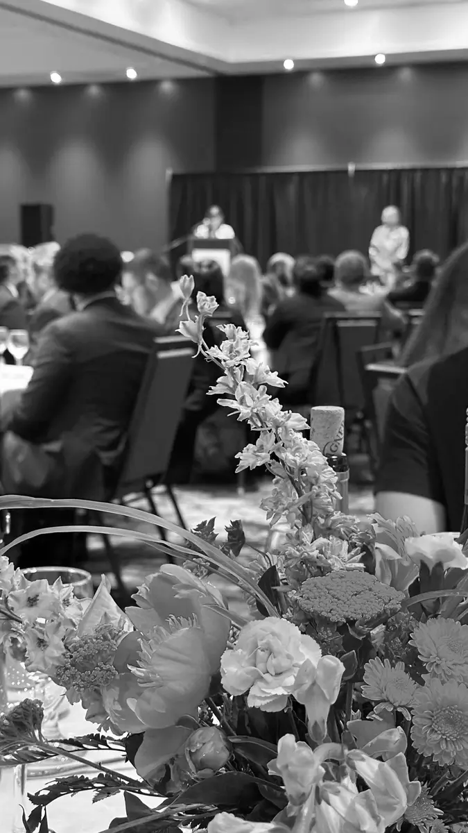 Banquet with a speaker addressing seated guests