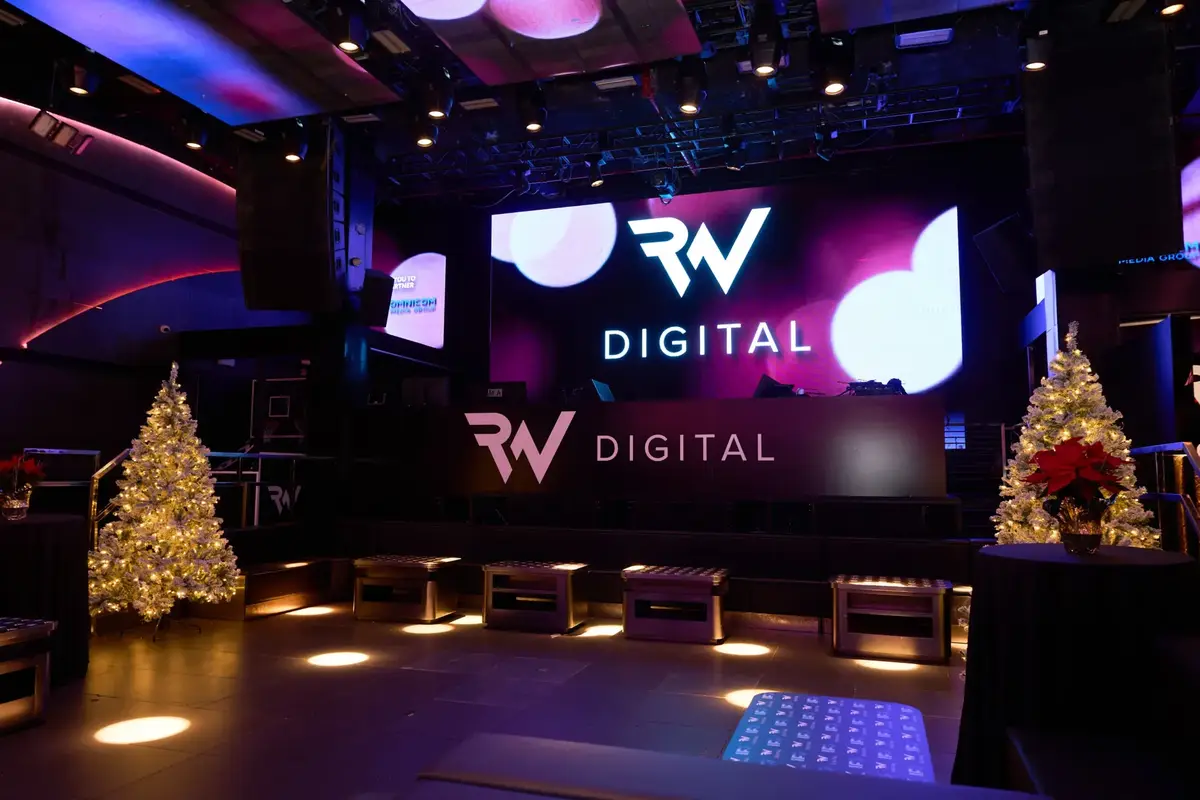 Holiday party venue with branded LED stage