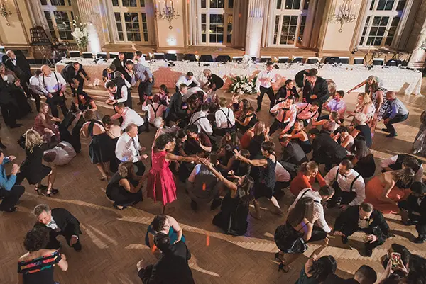 Large group dancing at a celebration