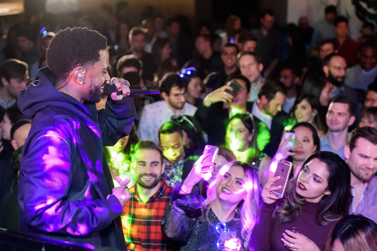 Performer and guests at a corporate party