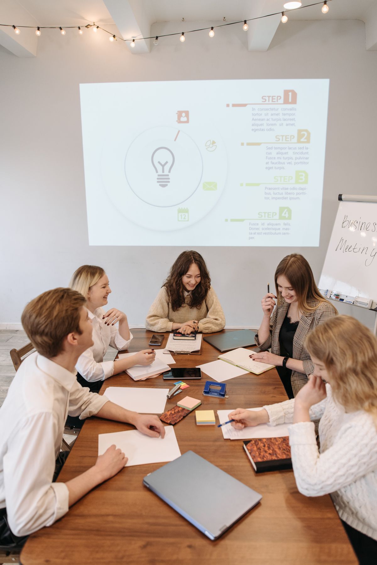 A team collaborating around a table during a workshop